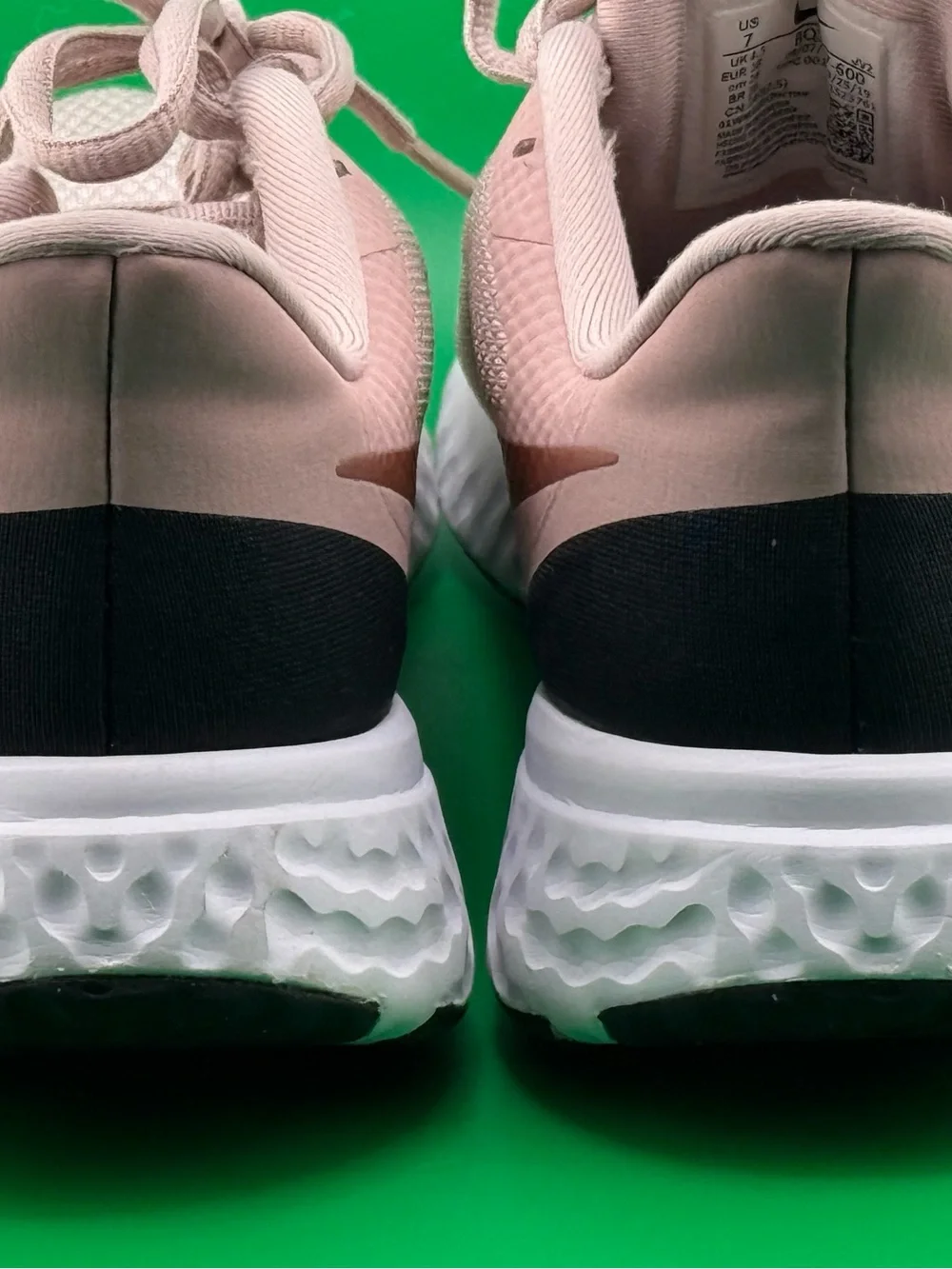 Nike Women's Blush Pink Athletic Running Sneakers with Subtle Gold Swoosh